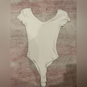 white body suit, ripped pattern, size s